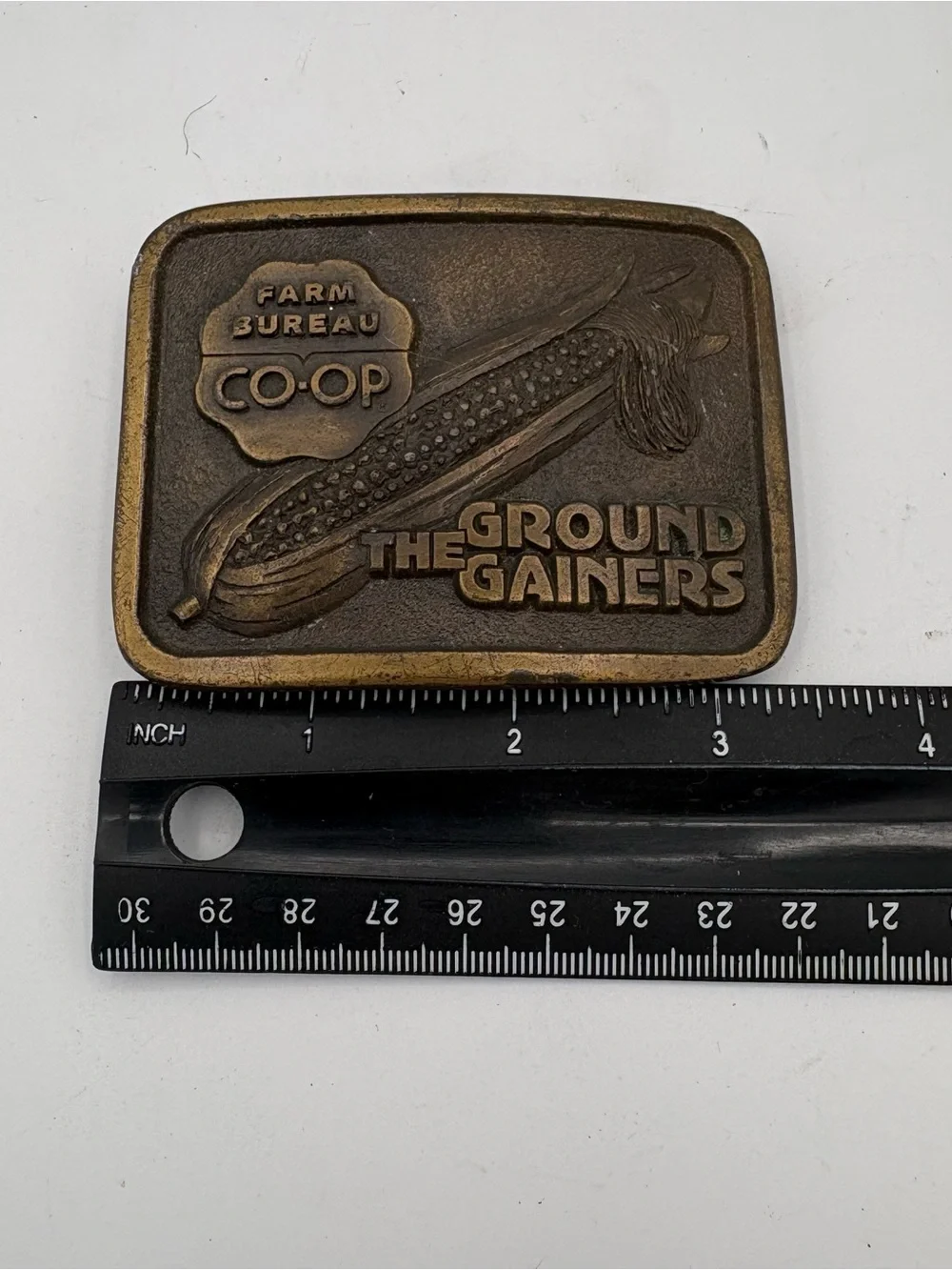 Vtg Brass Belt Buckle Farm Bureau CO-OP The Ground Gainers Farm Wear Stineburg